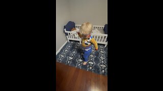 Toddler Loves to Brush His Hair Before Bedtime
