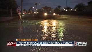 Heavy rain causes water to runoff from mountains into neighborhood