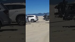 My husband help this gentleman tow his car out of the sand!