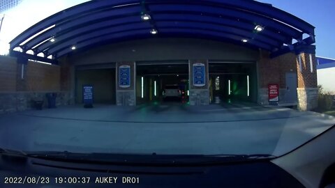 Driver POV through Car Wash with Neon Lights