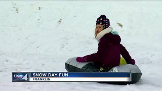 First big snowfall brings out sleds, tubes and skis
