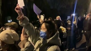 Protesters in Beijing March demanding freedom, not testing