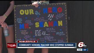 Hero teacher who stopped student gunman makes first public appearance, public remarks