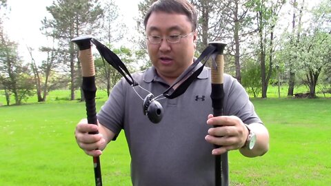 Two retractable, aluminum, anti shock, walking/hiking/trekking poles by Outzie