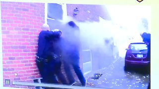 Body cam video shows Dearborn police officers work to rescue woman from burning home