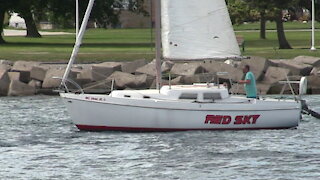 RED SKY Sailboat Light Cruise Under Bluewater Bridges In Great Lakes