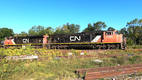 CN 5765 & CN 2293 Engines Manifest Train Eastbound In Woodstock Ontario