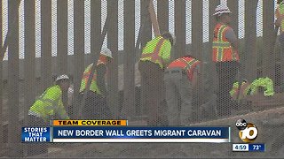 New border wall greets migrant caravan in San Ysidro