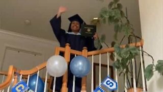 Young woman celebrates with homestyle graduation ceremony