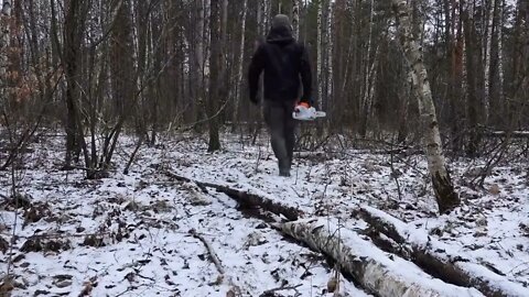 hiding in a huge dugout during a snow storm, spending the night in bushcraft shelter * 10