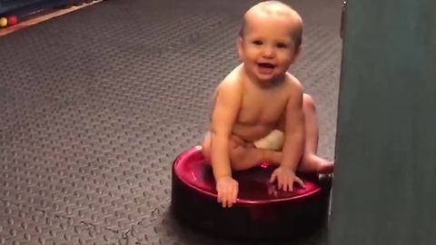 Baby Rides On Roomba Until He Falls Off Onto Kitchen Floor