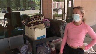 Woman collecting donations for Dumb Friends League in Castle Rock