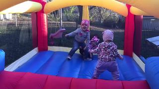 A Tot Girl Falls Out Of A Bounce House