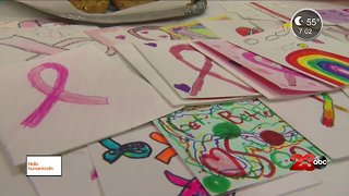 Students make Christmas cards for cancer patients