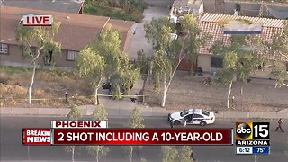 Man, child shot in Phoenix neighborhood