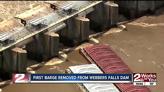 First barge removed from Webbers Falls dam
