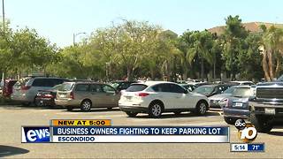 Business owners fighting to keep parking lot