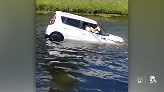 VIDEO: Woman rescued after car plunges into Boca Raton canal