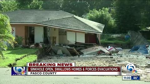 Sinkhole swallows 2 homes in Pasco County