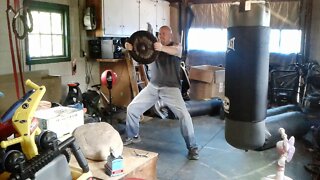 30 Second 35 lb Plate Raise Isometric In Horse Stance.