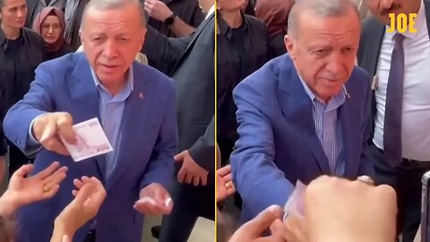 Turkish President Erdoğan hands out money at polling station during presidential election run-off