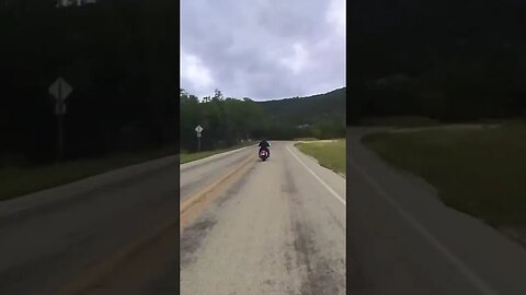 Harley Davidson Road King passing me in the Texas Hill Country