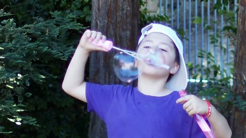 Blowing Bubbles Summer Fun for Kids - Slow Motion