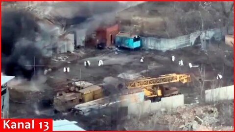 Russian soldiers come under fire while carrying their belongings and ammunition to their new "nest"