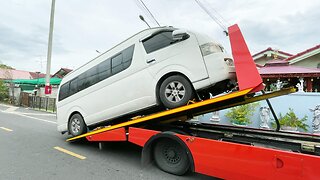 Loading a Passenger Van on a Tow truck