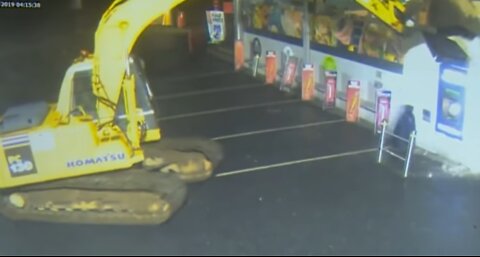 Stealing An ATM With An Excavator