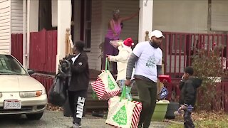 East Cleveland families surprised with early Christmas gifts from local organization
