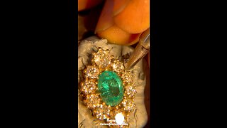 Hand making a vintage oval emerald and diamond gold ring ASMR
