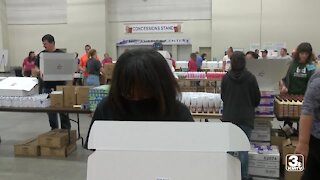 United Way volunteers pack back-to-school boxes to help kids start off on the right foot