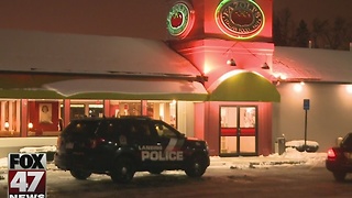 Lansing restaurant robbed at gunpoint overnight