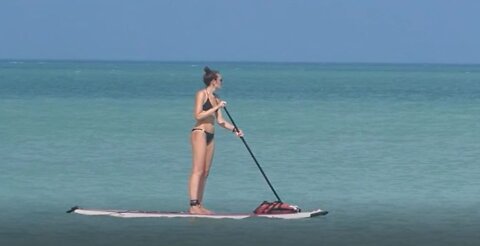 Paddleboarding on the sea, Isla Holbox, Yucatan, Mexico