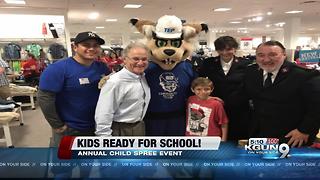 Annual Child Spree event provides clothing and school supplies