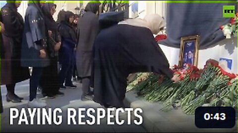 Russians lay flowers to honor President Raisi