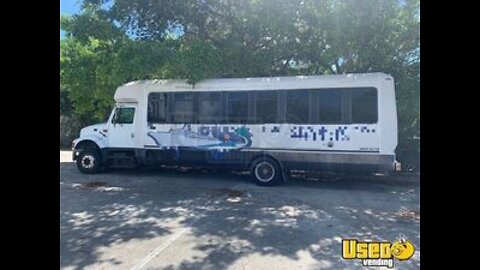 1997 International 3400 T444E | 33 Passenger Shuttle Bus for Sale in Florida