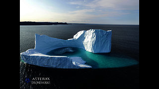 Majestic drone footage captures iceberg with a lagoon