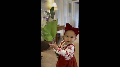 Baby gets Valentine’s Day flowers from her dada!