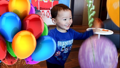 Toddler is SUPER EXCITED over Birthday Balloons!