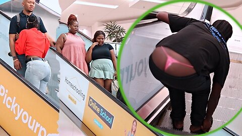 Men pranking using women's underwear Escalator