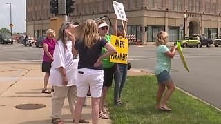 Protestors gather at Lorain courthouse to picket animal cruelty case where 21 dogs were seized