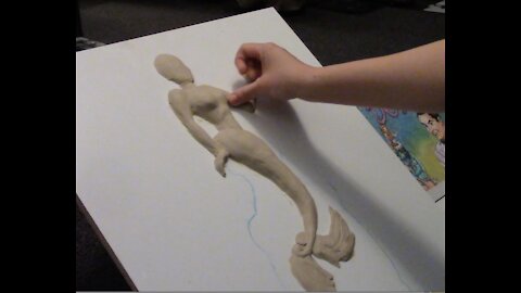 Sculpting a Mermaid Plaque
