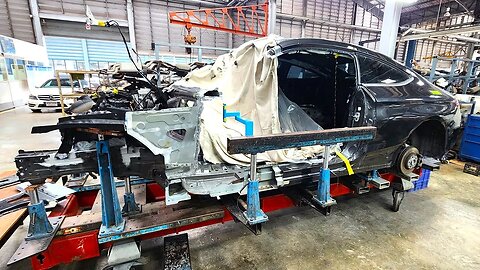 Mercedes-Benz C Coupe (C205) accident repair. A-pillar replacement with side gantry and jigs