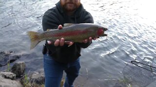 Huge Rainbow Trout caught in a monster river