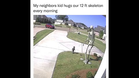 KId hugs the skeleton every morning.