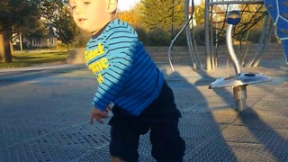 A Little Boy Is Super Dizzy After Riding A Merry-Go-Round