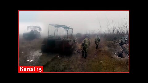 Russian soldiers who survived the battle show their destroyed position and military equipment