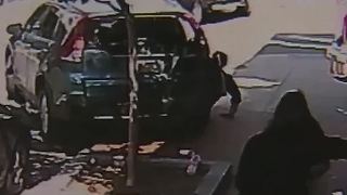 SUV runs over pedestrians on sidewalk